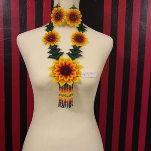 This is a beaded necklace with earrings